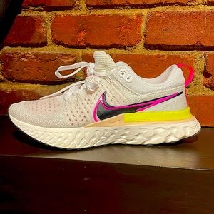 Nike Men's White Running Shoes with Pink, Yellow & Black Accents